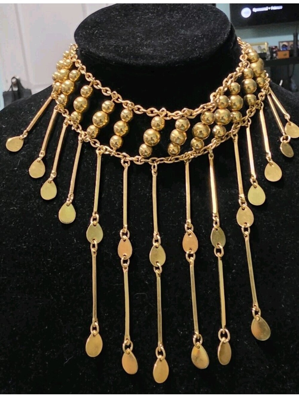 layered spherical beads and dramatic dangling fringe chains with teardrop Dangle